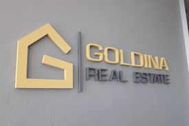 Goldina объемный логотип
